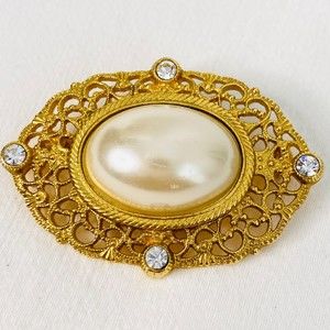 Oval Brooch Pearlesque Cabochon Framed By Rhinestone Gold Tone Filagree Pattern